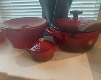 baby le creuset and big momma - the other one is sur la table - so keeping good company on the shelf -  thats a 3.5 qt le creuset big momma by the way