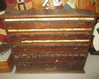 Vintage pharmaceutical label cabinet