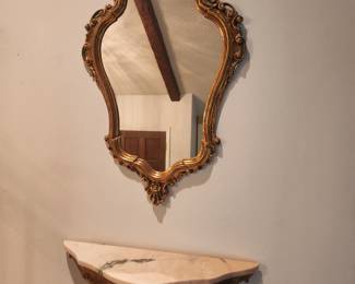 mirror and floating shelf
