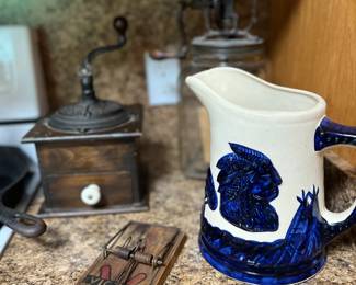glass butter churn coffee grinder and sleepy eye pitcher