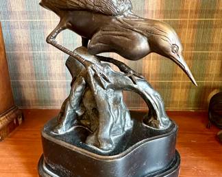 Cast bird metal