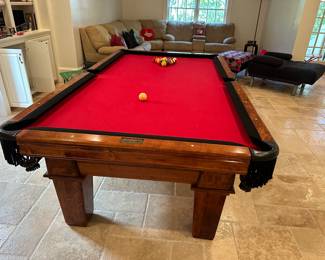 Pool table with UGA red felt