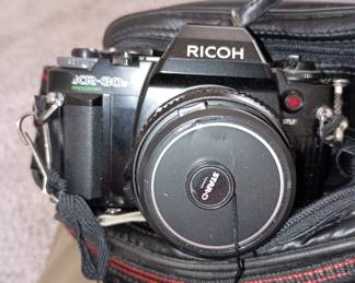 Ricoh KR-30 sp 
SLR camera with flash attachment 