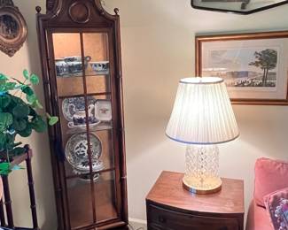 Curio cabinet in the corner