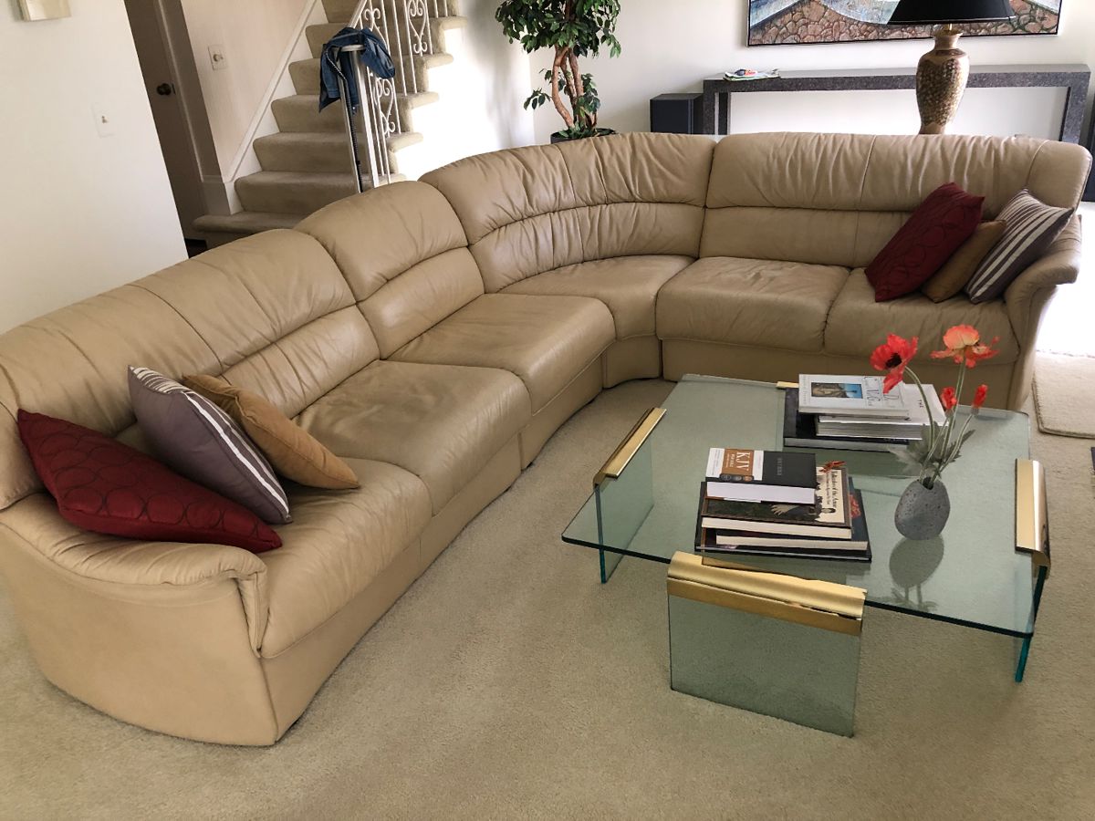 Classic Leon Rosen for PACE glass & brass cocktail table 38" inch square surrounded by leather sectional 98" X 108" 