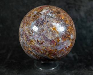 A large Pietersite Crystal Sphere. Comes on a clear plastic stand.
