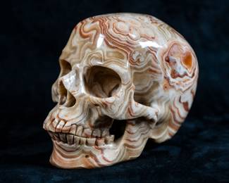 An Agate carved human skull.
