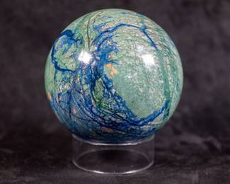 A large sphere made of Azurite Malachite. Originating from Russia. Comes with a clear plastic stand.

