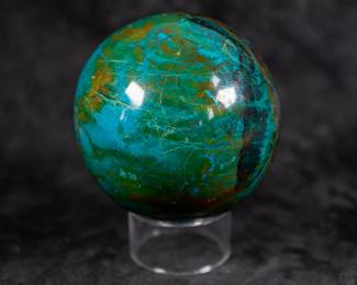 A large sphere made of Ocean Jasper with Chrysocolla. Comes on a clear plastic base.
