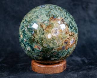 A large sphere made of Succor Creek Picture Jasper. Comes on a beautiful stained wood stand.
