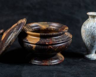 A Jasper urn and small stone vase made by artist Don Suiter. Both items are signed on the base by the artist.
