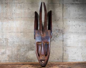 A Walu or Antelope mask originating from the Dogon People of Mali, West Africa. Masks with this design are often used in the cultural dances of the Dogon people.
