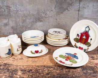 "Plantation Days" dinner set by artist, Yvonne Snead with original catalogue. This set includes mugs, plates, bowls & more, all signed by the artist. All artwork is under food safe, glaze and is dishwasher & microwave safe. Each piece by Snead is hand painted and signed.

