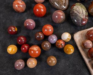 An assortment of spheres and stones made from many Jasper varieties. Largest stone dimensions are included.
