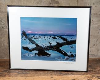 "Winter at Lava Lands" a sunrise photograph of the Oregon Cascades by photographer Charles A. Blakeslee printed in 1991.
