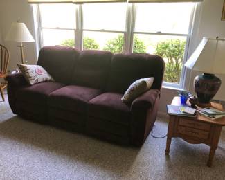 reclining couch, side table, lamps