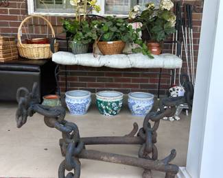 Andirons made from ship chains, golf clubs, planters, artificial flowers