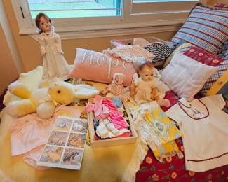 Vintage dolls, blankets and vintage children's clothing