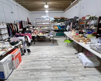 Full warehouse - much more added after this photo - many brand new gift items, cedar trunks, medical supplies, children's toys