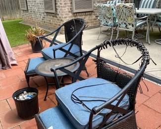 Patio Set with two chairs, foot stools and small table.