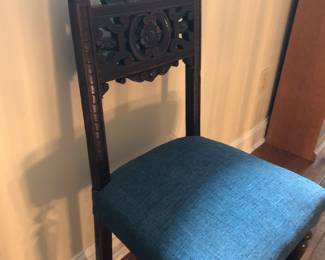 carved and upholstered side chair