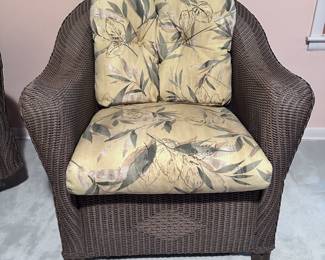 Two rattan rockers. Although the following photos photographed to look different colors, all match. Non-smoking home.