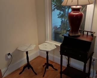 2 small marble tables
