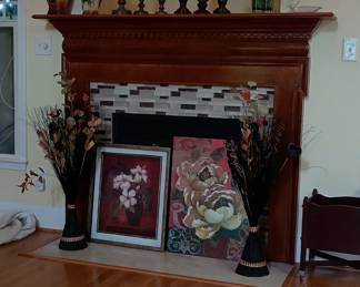 assorted candles, candlesticks, artwork and florals