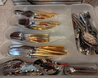 nice set of gold flatware
