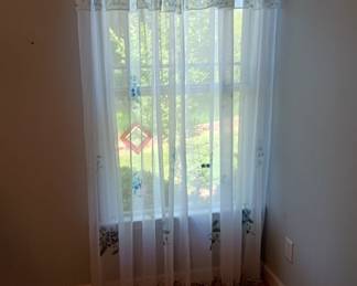 one of three pairs of 84 inch curtain panels