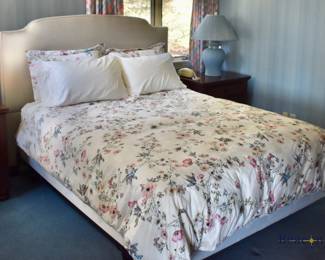 Queen bed with upholstered headboard