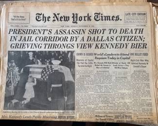 Vintage newspapers from important events in history: JFK + RFK assassinations, man walks on moon, Nixon's resignation
