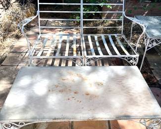 Wrought iron patio furniture: 4 chairs, coffee table + garden rack