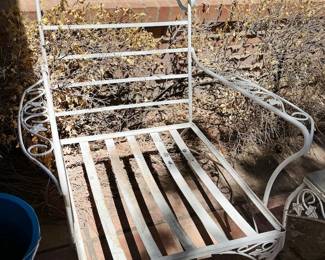 Wrought iron patio furniture: 4 chairs, coffee table + garden rack