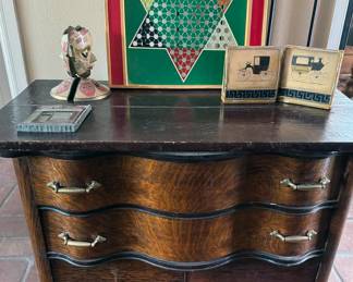 Antique dresser, vintage games, bookends, unique art