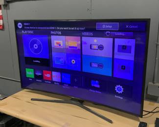 55” Samsung Curved Screen Smart TV.