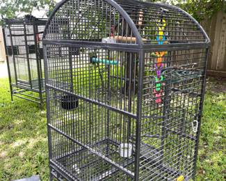 Two large bird cages