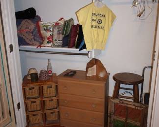 small chest of drawers, basket storage, pillows