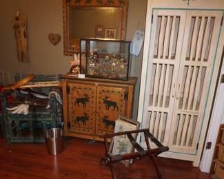 armoire, small chest, Kachina dolls, luggage rack, chair