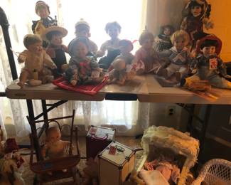 dolls and cases below