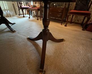 Kindel Winterthur Mahogany Dining table. 2 extension leaves, and table legs are on casters. Includes custom pads. Condition as shown.    68" x 46" plus 2- 12" leaves        