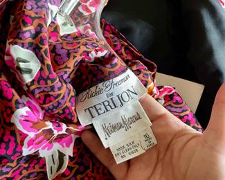 A few sets of Rickie Freeman for Teri Jon silk dress and jacket combos. 