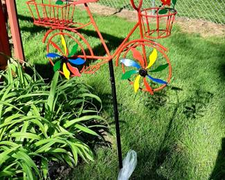 Adorable Bicycle Garden Decor. Wheels twirl in the wind.
