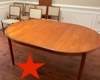 Red Star Pre-sale item-Mid Century Modern Teak  Dinning Table with 2 leaves.-  W/O leaf 46"w 29.5"h47"w  Each leaf is 19.5" ea     Made in Denmark .  Included are 6 teak chairs $2450 plus sales tax   