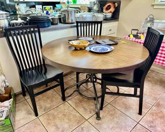 selling this round iron base table (from Haverty’s) separate from the FOUR sturdy black pier one chairs