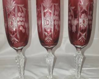 3 ruby colored crystal champagne glasses
