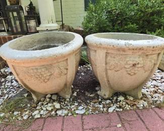 Pair of stunning solid concrete footed planters
