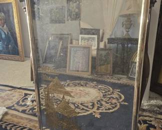 Gold framed mirror
