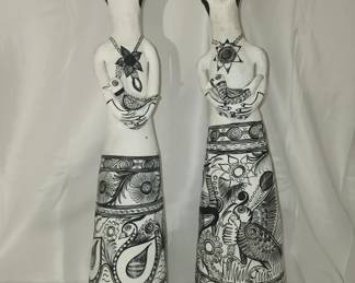 Pair of Vintage clay folk art style statues
