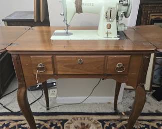 Vintage wood cabinet singer sewing machine
